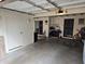 Spacious garage with tools, storage, work area, and access to exterior at 10624 W Oakmont Dr, Sun City, AZ 85351