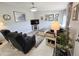 Cozy living room features comfortable seating, a television, and decorative accents creating an inviting atmosphere at 10624 W Oakmont Dr, Sun City, AZ 85351