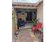 Covered patio features seating, decor, and tile flooring at 10624 W Oakmont Dr, Sun City, AZ 85351