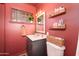 Bathroom with vanity, small window, and storage shelves at 1109 E 8Th St, Mesa, AZ 85203