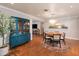 Charming dining room featuring a stylish chandelier, hardwood floors, and ample space for entertaining at 1109 E 8Th St, Mesa, AZ 85203