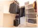 Organized closet with shelving for accessories and hanging space for clothing at 11207 N 165Th Ave, Surprise, AZ 85388