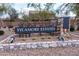 Elegant community sign for Sycamore Estates, set amongst desert landscaping and a stone base at 11207 N 165Th Ave, Surprise, AZ 85388