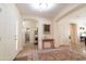 Bright home foyer with neutral walls, tiled floor, and decorative accents at 11207 N 165Th Ave, Surprise, AZ 85388