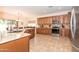 Bright kitchen with stainless steel appliances, granite countertops, and ample cabinet space at 11207 N 165Th Ave, Surprise, AZ 85388