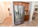 Stainless steel refrigerator complementing the kitchen's design and style at 11207 N 165Th Ave, Surprise, AZ 85388