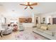 Open-concept living room providing seamless transitions to the kitchen and dining area at 11207 N 165Th Ave, Surprise, AZ 85388