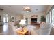 Inviting living room with ample seating, natural light, and seamless flow throughout the home at 11207 N 165Th Ave, Surprise, AZ 85388