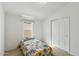 Cozy bedroom with a single bed, window and closet at 11596 W Sierra Dawn Blvd # 99, Surprise, AZ 85378