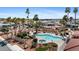 Community pool and spa area with a shaded cabana and plenty of seating for residents at 11596 W Sierra Dawn Blvd # 99, Surprise, AZ 85378