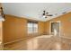 Bright living room featuring laminate flooring and natural light at 11596 W Sierra Dawn Blvd # 99, Surprise, AZ 85378