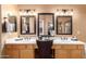 Spacious bathroom featuring double sinks, framed mirrors, and ample counter space at 1165 E Erie St, Gilbert, AZ 85295