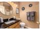 Well-lit bathroom with granite countertop, undermount sink and modern fixtures at 1165 E Erie St, Gilbert, AZ 85295