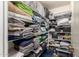 Shelves filled with towels and linens provide ample storage space at 1165 E Erie St, Gilbert, AZ 85295