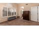 Comfortable main bedroom featuring plantation shutters and plenty of storage space at 1165 E Erie St, Gilbert, AZ 85295