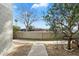 Relaxing front yard with sidewalk and gravel, showcasing beautiful greenery and trees at 122 S Hardy Dr # 6, Tempe, AZ 85281