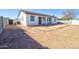 Wide-open backyard offers great potential for outdoor living and entertaining at 12722 W Diaz Dr, Arizona City, AZ 85123