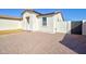 Charming home featuring neutral stucco, a gravel yard, and a covered entry at 12722 W Diaz Dr, Arizona City, AZ 85123