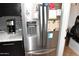 Stainless refrigerator with ice maker and freezer near kitchen counter with marble countertop at 13219 W Aleppo Dr, Sun City West, AZ 85375