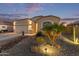 Inviting single-story home featuring a two-car garage, with desert landscaping for low maintenance at 13529 W Remuda Dr, Peoria, AZ 85383