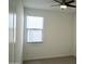 Bedroom featuring a ceiling fan, bright blinds and neutral colored carpet at 14132 W Valentine St, Surprise, AZ 85379