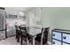 Dining area featuring gray cabinetry with a wine rack, white backsplash, and natural light at 1435 W 6Th St, Mesa, AZ 85201