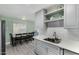 Bright kitchen with gray cabinets, white countertops, and modern stainless steel sink and faucet at 1435 W 6Th St, Mesa, AZ 85201