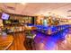 Upscale bar area with modern lighting, comfortable seating, and a fully stocked bar, ideal for socializing and relaxation at 1538 E Peach Tree Dr, Chandler, AZ 85249