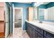 Stylish bathroom with a stand-up shower and vanity with a marble countertop at 1538 E Peach Tree Dr, Chandler, AZ 85249