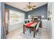 Dining area showcasing tile floors, plantation shutters, and stylish decor at 1538 E Peach Tree Dr, Chandler, AZ 85249