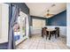 Cozy dining area with lots of natural light and an adjacent patio entrance at 1538 E Peach Tree Dr, Chandler, AZ 85249