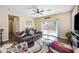 Comfortable living room featuring stylish furniture and a sliding glass door to the backyard at 15646 N 20Th Ave, Phoenix, AZ 85023