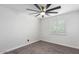 Bedroom featuring a modern ceiling fan and plantation shutters at 1610 W Dunlap Ave, Phoenix, AZ 85021