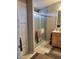 Bathroom showcasing a modern shower, storage cabinet, and vanity at 17200 W Bell Rd # 2301, Surprise, AZ 85374