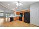 Well-lit kitchen with stainless steel appliances, wood cabinets, and light countertops at 19602 N Canyon Whisper Dr, Surprise, AZ 85387