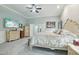 Serene main bedroom with elegant decor, plush carpeting, and custom furniture at 2102 E Norwood St, Mesa, AZ 85213