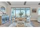 Dining area featuring a round table, a cabinet, and sliding doors to the outdoor patio at 21036 E Stacey Rd, Queen Creek, AZ 85142