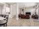 Open-concept living room featuring wood floors and a ceiling fan at 2348 W Flint St, Chandler, AZ 85224