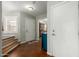 Welcoming foyer with tile flooring, staircase, and view into another room at 2562 E Oxford Ct, Gilbert, AZ 85295