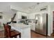 Bright kitchen featuring modern appliances and ample counter space, all seamlessly connected to living area at 2562 E Oxford Ct, Gilbert, AZ 85295