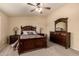 Serene bedroom featuring neutral tones, ceiling fan, and plush carpet flooring at 2708 E Desert Rose Trl, San Tan Valley, AZ 85143