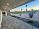 Covered patio area with a view of lush greenery, landscaping and neighborhood at 2734 N Trevino Pl, Mesa, AZ 85215