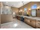 Spa-like bathroom with a large vanity, modern lighting, and a separate shower with elegant marble tile surround at 30416 N 64Th Street --, Cave Creek, AZ 85331