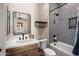 Bathroom featuring beautiful blue tile shower with shelf, and a floating wood vanity at 30416 N 64Th Street --, Cave Creek, AZ 85331