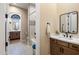 Beautiful bathroom featuring tile floors, cabinets with lots of storage, and sinks with stainless steel faucets at 30416 N 64Th Street --, Cave Creek, AZ 85331