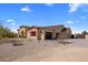 Exterior elevation of a single Gathering home with desert landscaping and a three car garage at 30416 N 64Th Street --, Cave Creek, AZ 85331