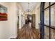 Welcoming foyer with wood floors, a chandelier, and a view into the living spaces at 30416 N 64Th Street --, Cave Creek, AZ 85331