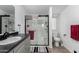 Bathroom with glass shower, modern fixtures, and neutral tones at 30446 W Portland St, Buckeye, AZ 85396