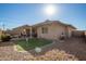 Backyard featuring a putting green, desert landscaping, and covered patio at 3061 S Elderwood --, Mesa, AZ 85212