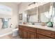 Charming bathroom with granite countertop, stylish vanity, and decor at 3061 S Elderwood --, Mesa, AZ 85212